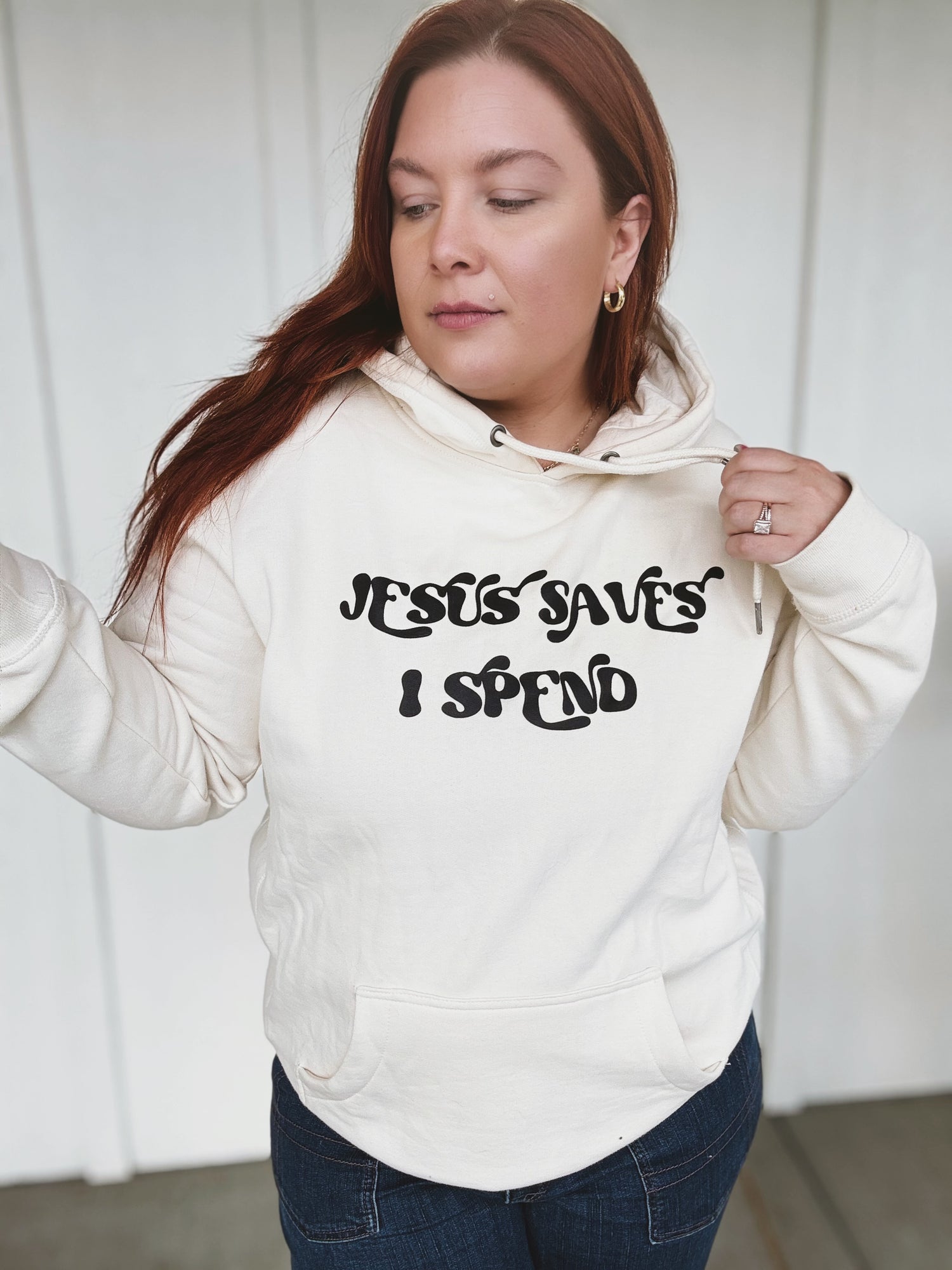 Jesus Saves I Spend Hoodie in Cream